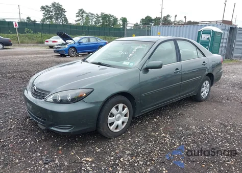 2003 Toyota Camry Le from USA, damaged, VIN 4T1BE32K73U766181
